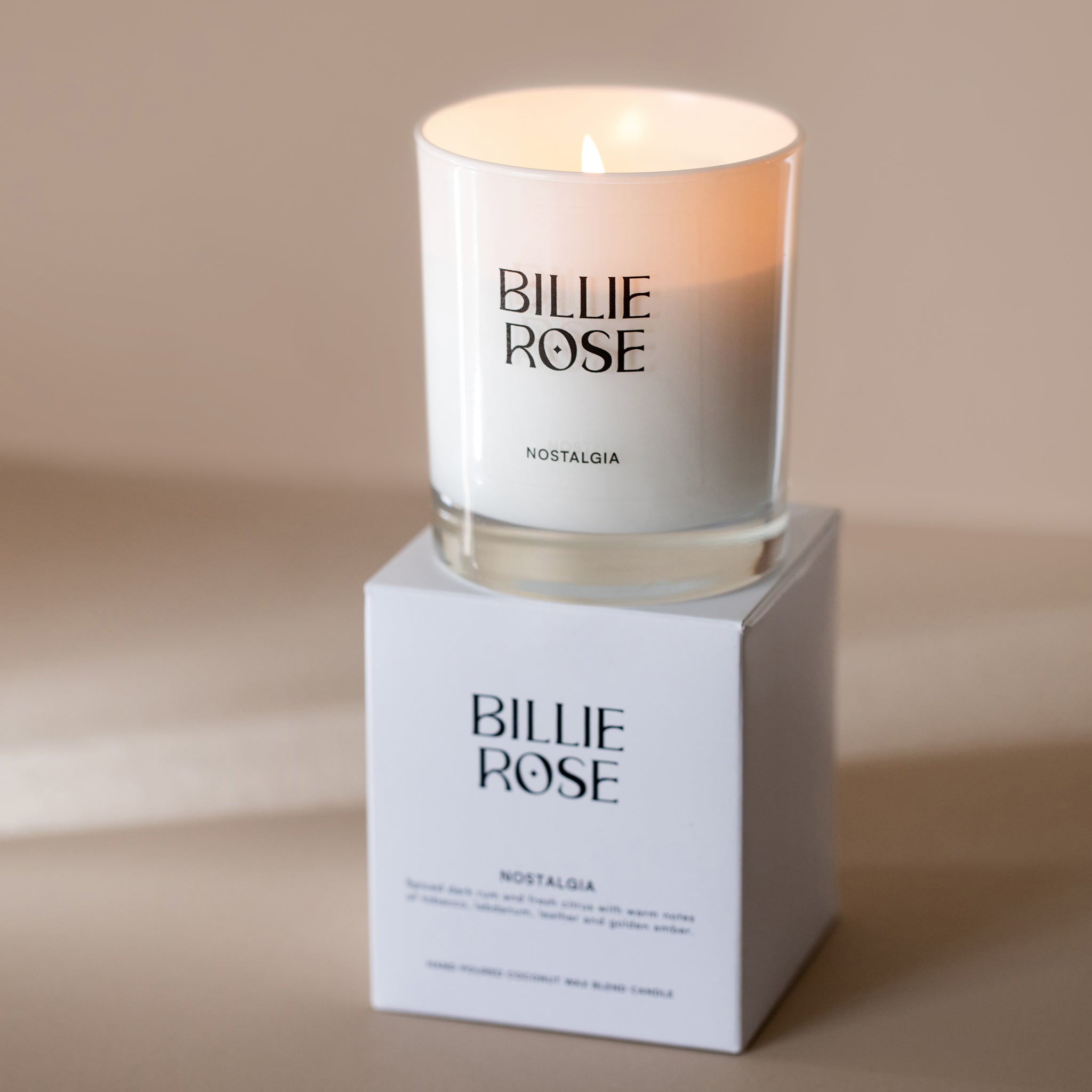 Billie Rose candle on a white packaging box against a beige background