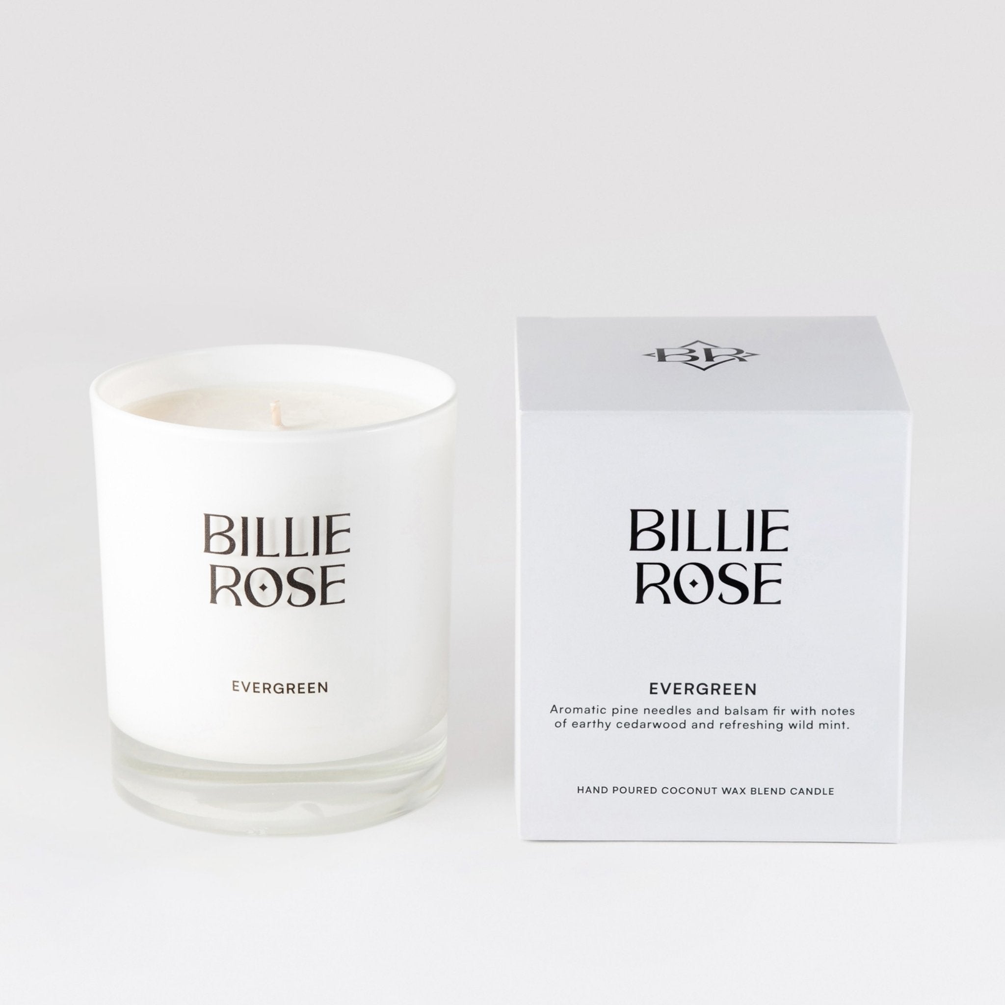 unlit candle in white glass jar with with white outer box