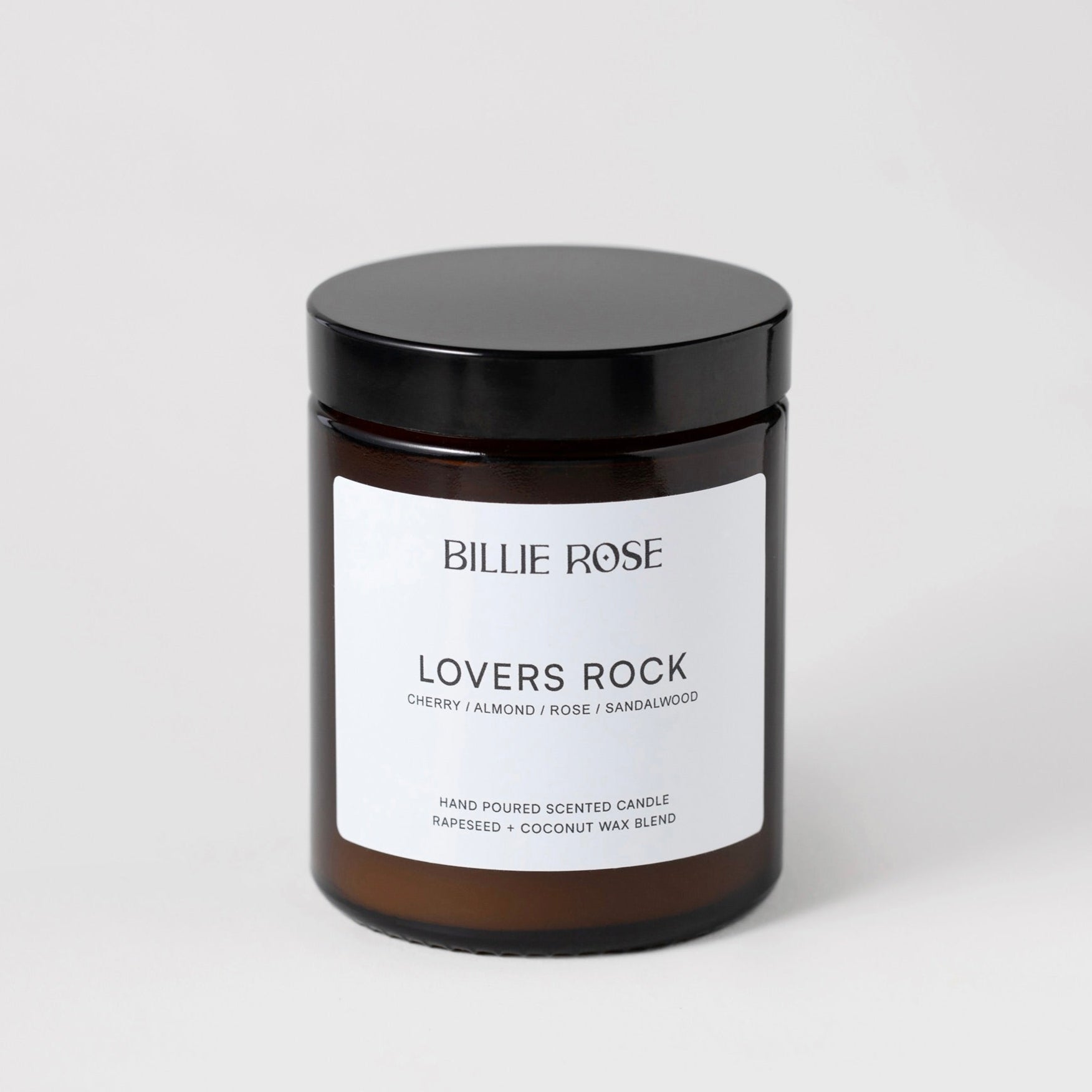 Lovers Rock scented candle on plain background