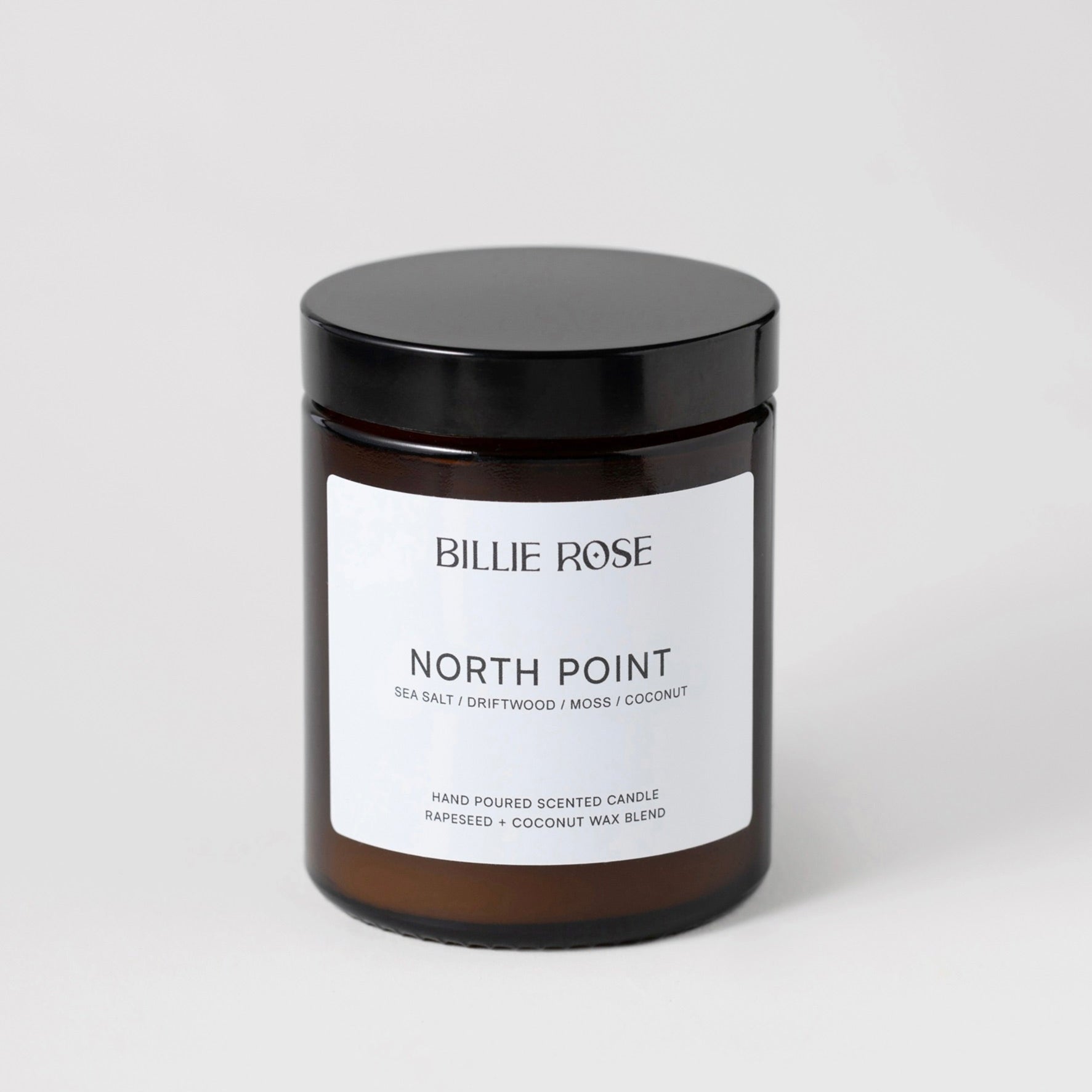 scented candle with lid on plain background