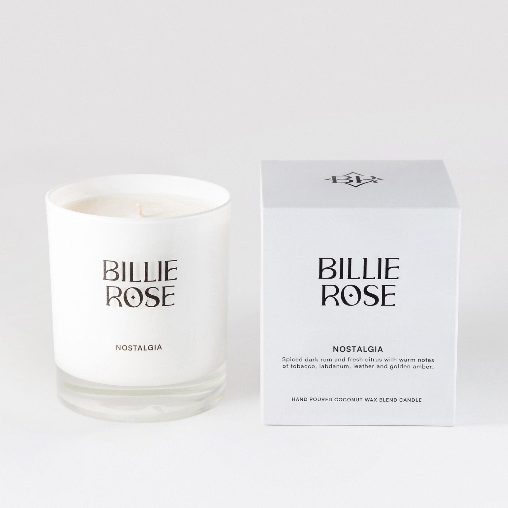 unlit candle in white glass jar with with white outer box