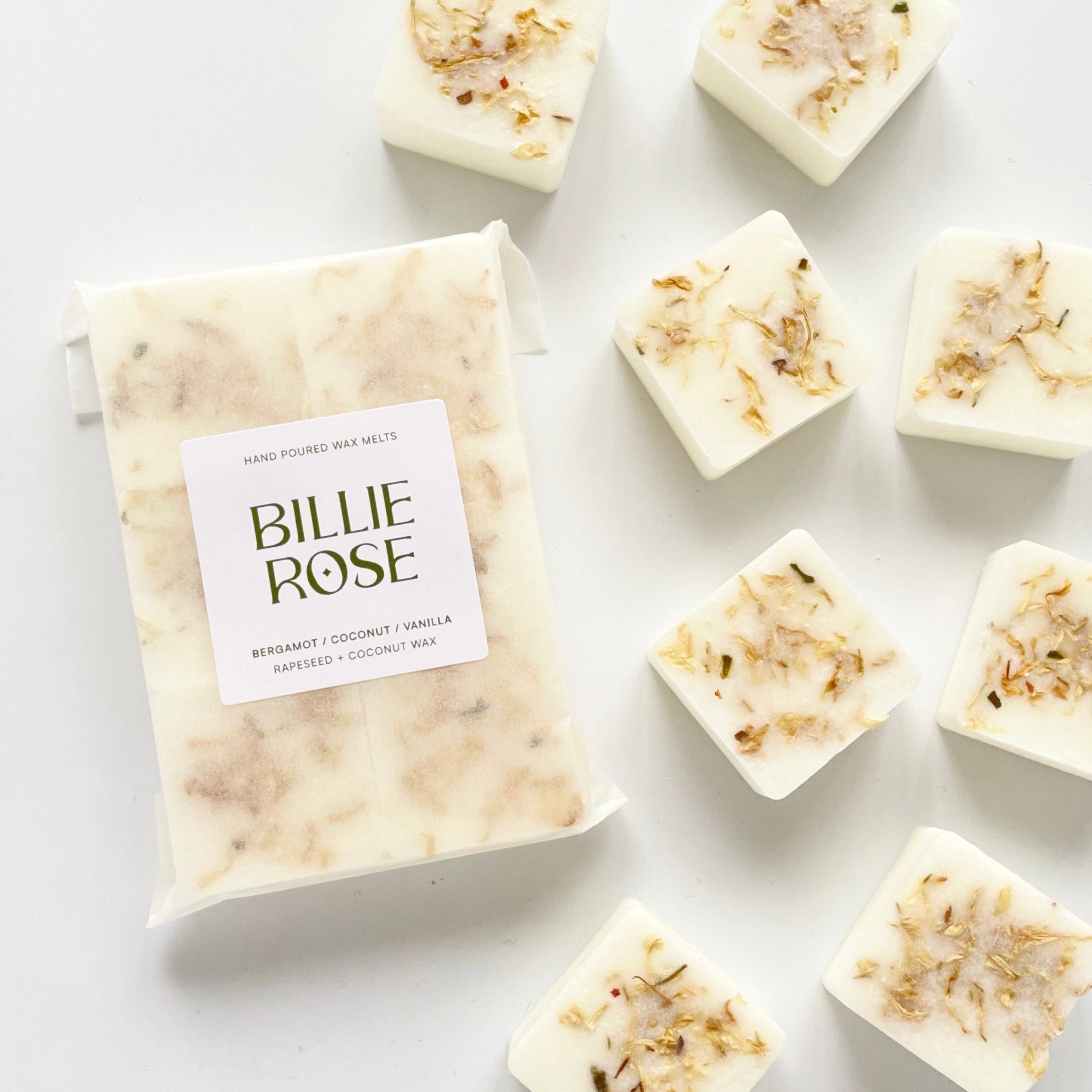 Pack of Bergamot, Coconut & Vanilla wax melts surrounded by loose wax melts