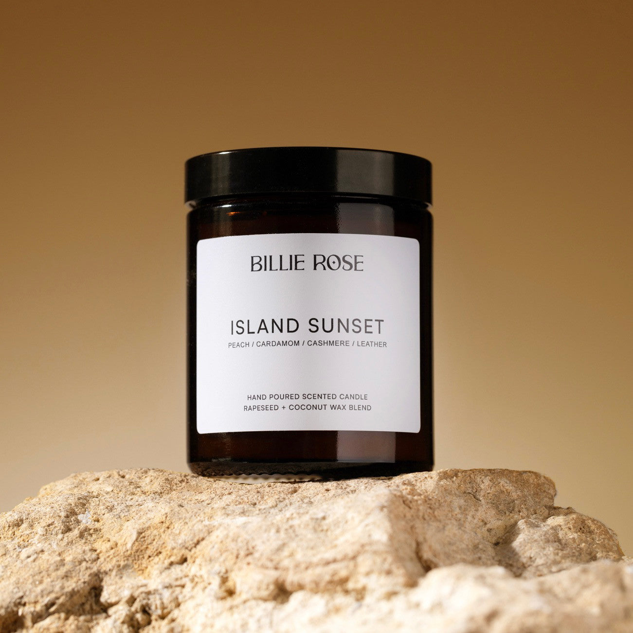 Billie Rose Island Sunset amber jar candle on warm background