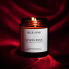 Billie Rose 'Lovers Rock' candle on a red fabric background